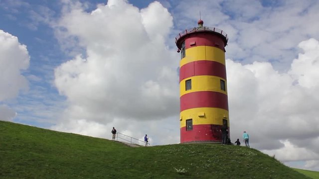 Clouds passing by Lighthouse in Friesland