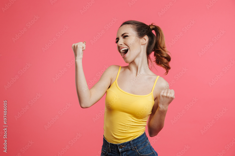 Wall mural Portrait of a happy young girl