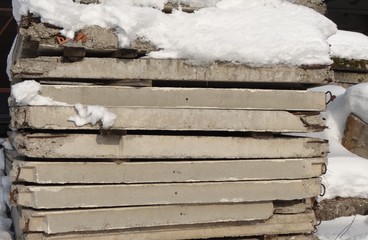 Reinforced concrete slabs covered with snow.