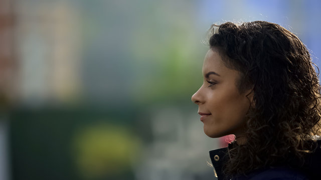 Inspired Female Model Smiling, Beautiful Biracial Young Lady Portrait In Profile