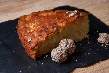 Delicious fresh baked piece of apple pie on shale board