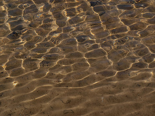 Shiny surface of the water in the sunlight