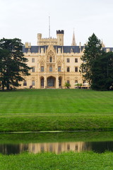 Castle pond with Lednice mansion in Lednice Valtice area, Moravia, Czech Republic, summer day