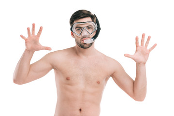 handsome young shirtless man in snorkel and scuba mask looking at camera isolated on white