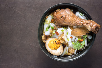 Top view of Paste of Rice Flour with Chicken Drumstick.