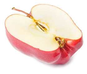 Red apple cut in half isolated on white