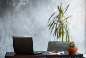 Work on laptop computer. Clean scene of the desk in office or room.