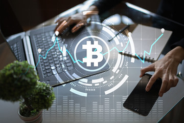 Cryptocurrency graph on virtual screen. Business, Finance and technology concept. Bitcoin, Ethereum.