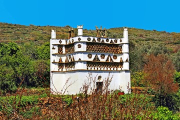 Traditional dovecote at the village of Tarambados in Tinos island, Cyclades, Greece.
