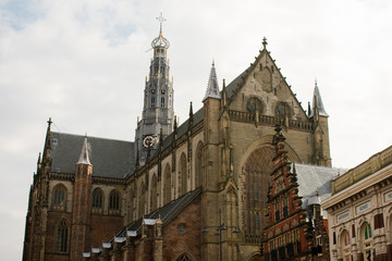 Fototapeta na wymiar Haarlem City Streets Center Ancient Old Buildings Church Gates Netherlands
