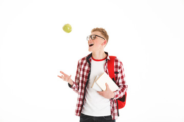 Portrait of a cheerful schoolboy in eyeglasses