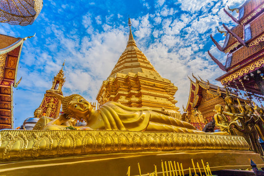 golden pagoda in wat Phrathat Doi Suthep under blue sky.Temple is tourist attraction of Chiang Mai, Thailand.