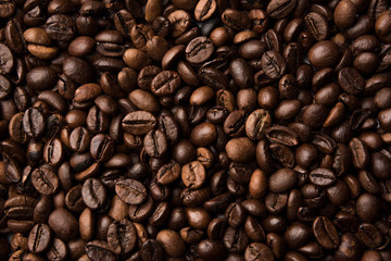 Mixture of different kinds of roasted coffee beans. Coffee Background