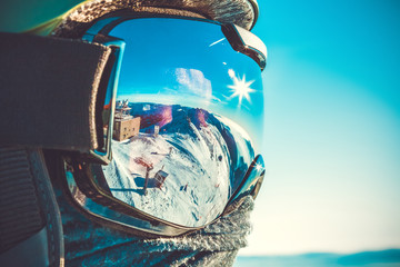 Winter sports concept - snowboarder in mask - outdoors shot