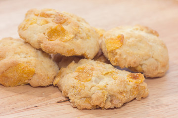 pile of Oatmeal cookies on wooden plate