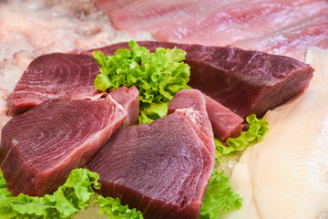 fresh tuna steak on the counter