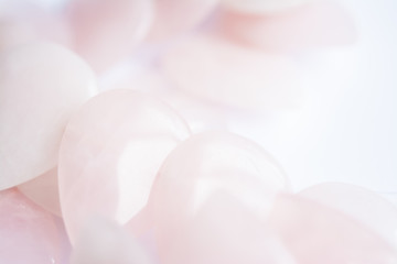 Blurred abstract art closeup with selective focus of beautiful attractive shiny beads in a fashion...
