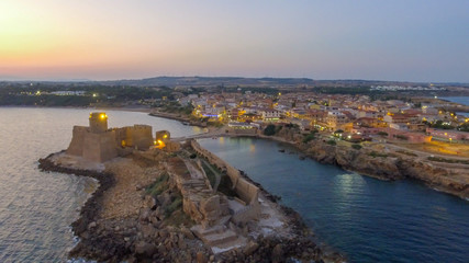 Sunset aerial view of Aragonese Fortress, Calabria - Italy