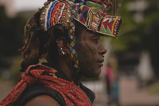 Maasai man wearing beaded headwear