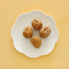 Walnuts top view. Jewish pesah celebration symbols (jewish Passover holiday).