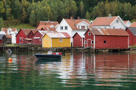 Boathouses on the Shores of the Lustrafjorden