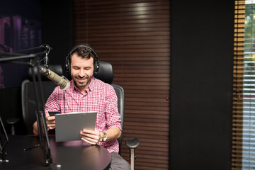 Radio presenter taking on air interview