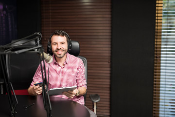 Radio presenter hosting a show
