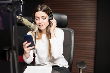 Radio host communicating on air in studio