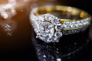 Jewelry diamond rings with reflection on black background