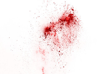 Fototapeta na wymiar Red powder explosion on white background. Colored cloud. Colorful dust explode. Paint Holi.