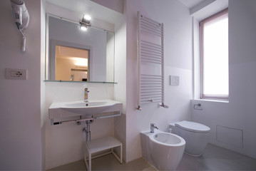 Obraz na płótnie Canvas bathroom with complete sanitary ware 