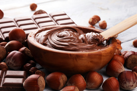 Homemade hazelnut chocolate spread in wooden bowl. Hazelnut Nougat cream
