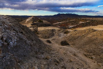 View of the dragon's back biking trails during a cloudy sunset