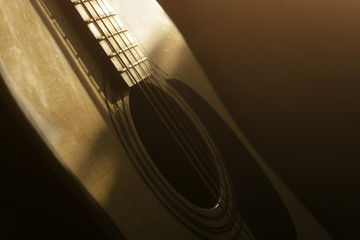 Obraz premium acoustic guitar in the light of the Sun
