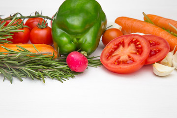 Variety of vegetables, on the white wooden table, top view, copy space, selective focus