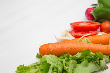 Variety of vegetables, on the white wooden table, top view, copy space, selective focus
