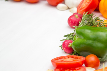 Variety of vegetables, on the white wooden table, top view, copy space, selective focus