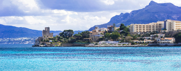 amazing picturesque small coastal town Santa Flavia with old castle . Sicily, Italy