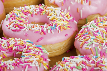 Close up of colorful and delicious donuts
