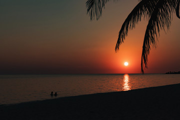 Cuba, Playa Ancon beach. Colorful sunset at Playa Ancon Near Trinidad in Cuba