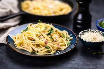 Spaghetti carbonara with egg and pancetta
