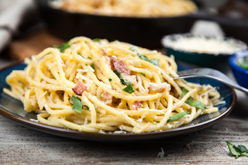 Spaghetti carbonara with egg and pancetta