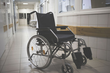 Wheel chair at corridor of hospital.