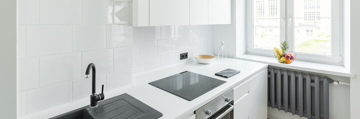 Kitchen with white tiling - obrazy, fototapety, plakaty