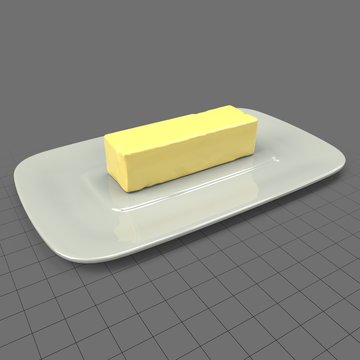 Stick of butter on plate