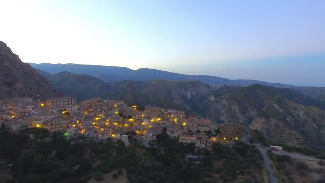 Stilo panoramic aerial view at night, medieval town, Calabria - Italy