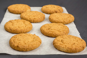 baking oatmeal cookies. homemade cookies on parchment. bakery products