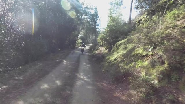 Riding dirt bike in a forest in Cyprus
