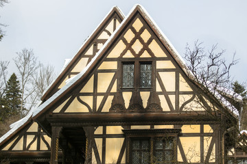 Part of a house in the typical alpine architectural style of Sinai, Romania.