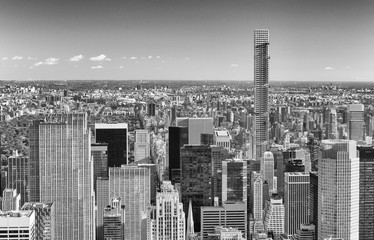 NEW YORK CITY - OCTOBER 23, 2015: Aerial view of Manhattan from city rooftop. New York attracts 50 million people every year